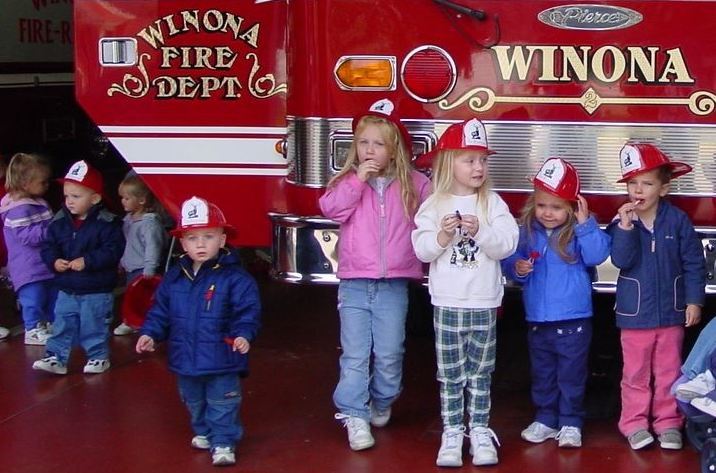 Kids by fire truck