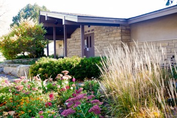 View of the Lake Lodge Recreation Center Building From a  Nearby Garden